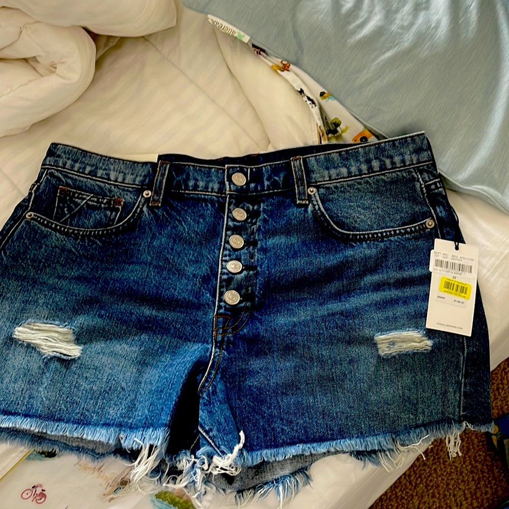 Super pair of Seven for all Mankind blue jean shorts. Ships in one day.